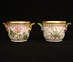 Royal Copenhagen: To Flora Danica vinkølere af porcelæn. #3570. H: 12,2cm. D: 
14,5cm eksl hanke