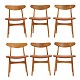 Wegner CH30. Sæt på seks Hans J. Wegner, CH30, stole nyt betrukket med cognac 
farvet læder. Teak og eg